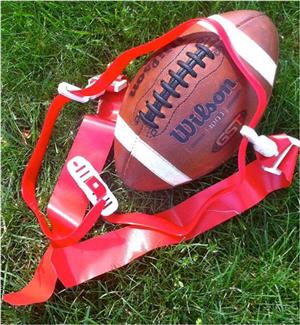 Wilson football with red flag belt