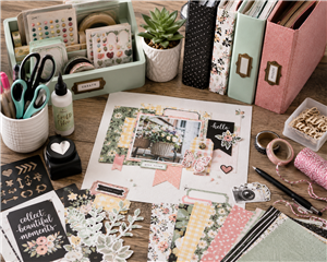 Table with scrapbook papers and supplies