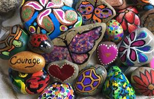 several colorful, painted rocks