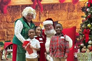 Mr. and Mrs. Claus with 3 children